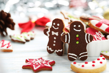 Christmas cookies in bowl on a blue wooden table