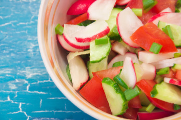 vegetable salad on a blue background