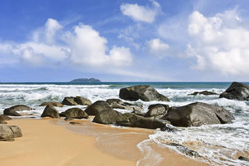 Rock formation in the surf of Sanya, Hainan Island, China