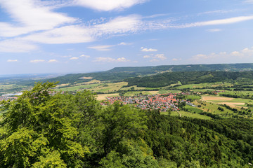 Fototapeta na wymiar German village countryside with green trees.