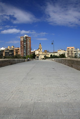 Fototapeta na wymiar VALENCIA, SPAIN - AUGUST 26, 2012: Puente de Serranos and Church de Santa Monica