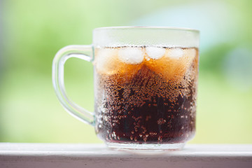 cola with ice cubes