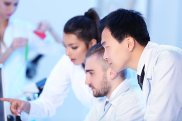 Fototapeta na wymiar Young medical technicians working in laboratory