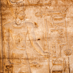 old egypt hieroglyphs carved on the stone