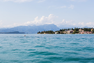 Lake Garda is the largest lake in Italy. It is located in Northern Italy, about half-way between Brescia and Verona, and between Venice and Milan.