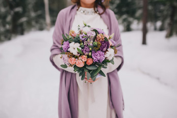 Bridal bouquet flowers closeup, beauty winter wedding