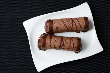 Two sweet tubes with cream - dessert