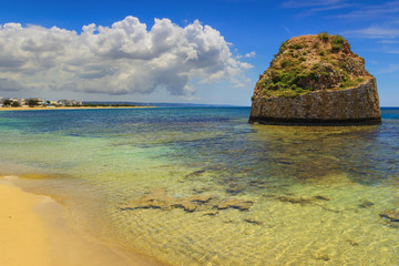 Fototapeta na wymiar SUMMER Salento coast: Torre Pali beach (Lecce). ITALY (Apulia).The low sandy coastline is charactherized by dunes covered with Mediterranean scrub.Its name comes from the sixteenth-century watchtower.