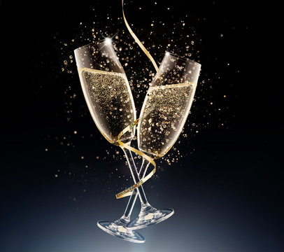 glasses of champagne on a black background.