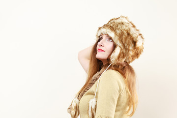 woman wearing wintertime clothes fur cap