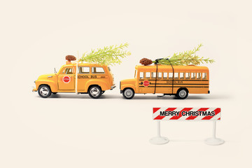 School buses toy model and Christmas tree.Christmas background with Copyspace for text .