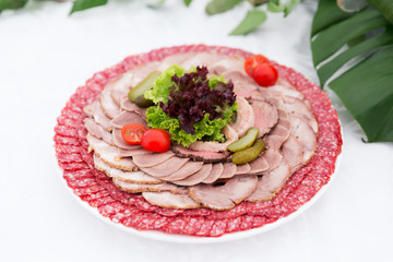 Served table layout with meat snack plate