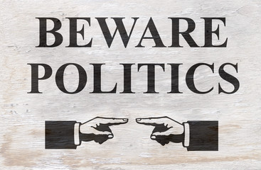 beware politics sign on wood grain texture