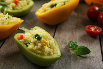 Stuffed peppers with vegetables on table close up