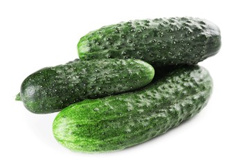 Ripe cucumbers isolated on white