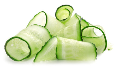 Sliced cucumbers isolated on white