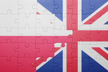 puzzle with the national flag of great britain and poland