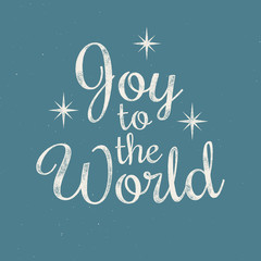 Joy to the World - Christmas retro lettering. Vector ink stamp effect, grunge background.
