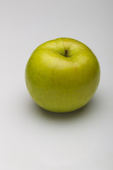 Green apple on a white background