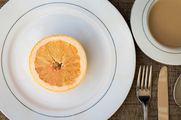 grapefruit breakfast plate with coffee