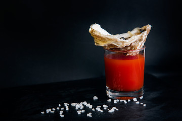 Bloody mary cocktail with oyster