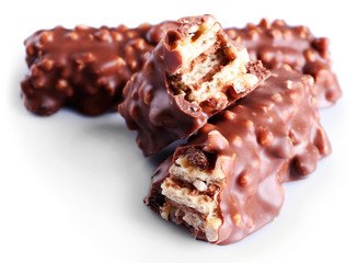 broken crispy candy bars, isolated on white