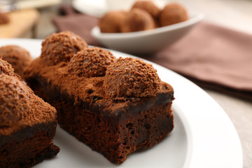 Pieces of chocolate cake on the table, close-up