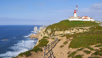 Fototapeta na wymiar Cap da Roca lighthouse at coast in Portugal