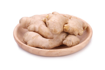 fresh ginger on disk wood