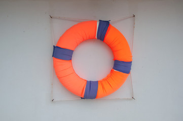 life vest on white wall