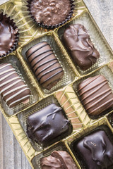 vertical image of an assortment of chocolates.