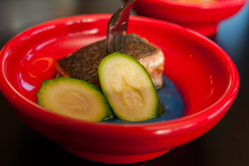 grilled salmon served with fresh cucumber