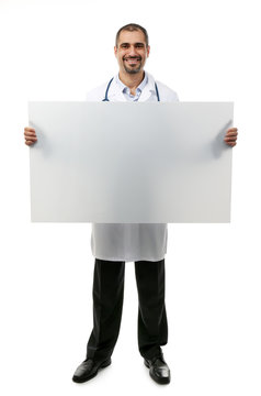 Doctor holds big white board in hands isolated on white background
