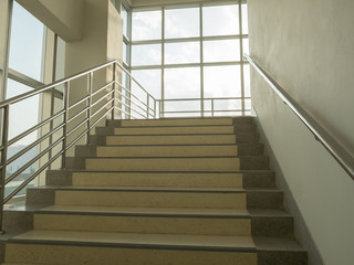 Cream stairs with window and sky destination