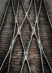 Fototapeta na wymiar Multiple railway track switches , symbolic photo for decision, separation and leadership qualities