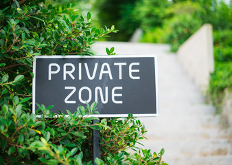 Sign in the park walking way private zone