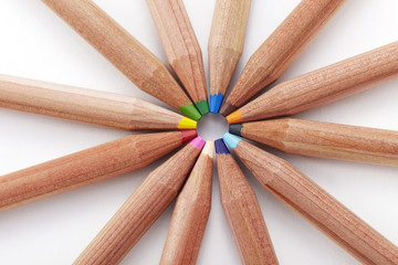 Color pencils on white background closeup 