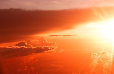 Fototapeta premium Amazing view from plane on sunrise sun and clouds