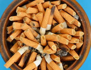 cigarette filter in ceramic ashtray