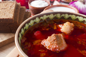 Pieces of meat in the borscht soup