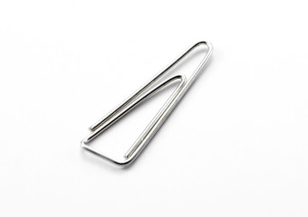 Color paperclips on white background