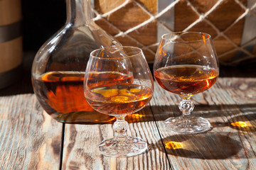 Glasses of cognac and a bottle