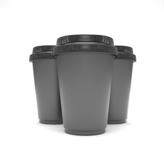 Three paper coffee cups