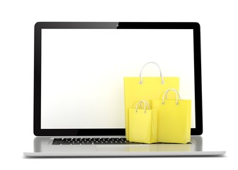 laptop and  shopping pags on white background