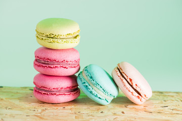 series Colorful and tasty French cookies Macarons on a colorful