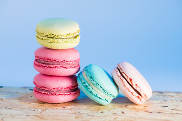 series Colorful and tasty French cookies Macarons on a colorful