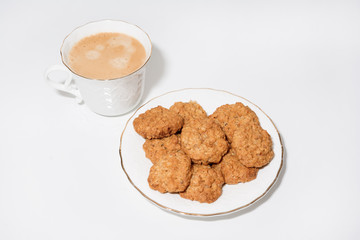 White cup of espresso coffee  and cookies on white background 