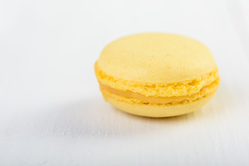 Yellow Lemon French Macaroon On White Wood Boards Background