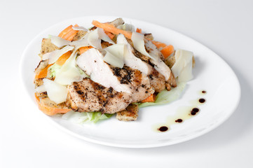 plate with grilled meat and garnish