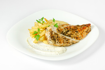 plate with grilled white meat and fries